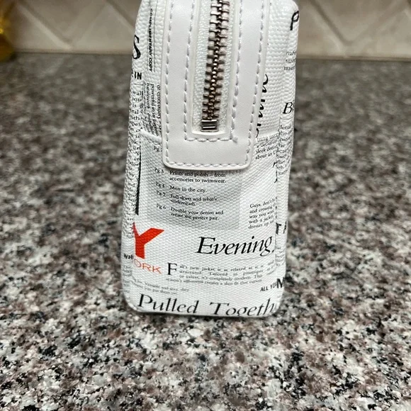 DKNY cosmetic bag. Brand new with tag. NYC scenery makes this a special item! - Picture 2 of 6